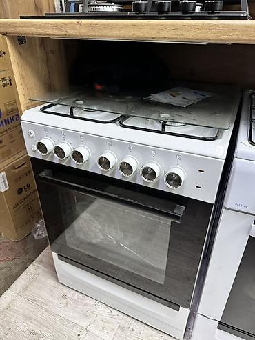Газовая плита с духовкой - 4 конфорки на газу с чугунными решётками