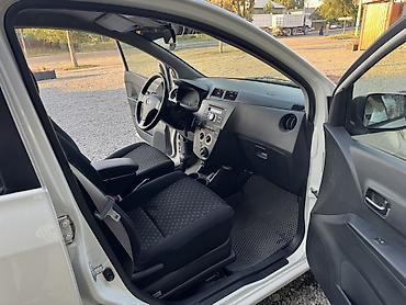 бу болон: Daihatsu Cuore: 2009 г., 1 л, Автомат, Бензин, Хэтчбэк — 6