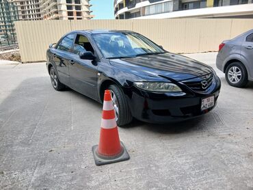 Su nəqliyyatı: Mazda 6: 2.3 l | 2005 il Sedan