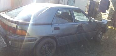 Mazda: Mazda 323: 1992 г., 1.6 л, Механика, Бензин, Седан