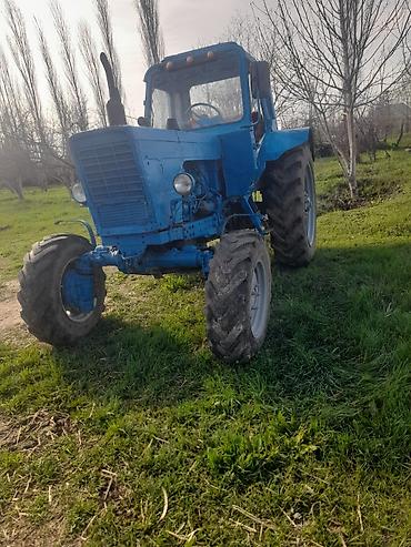 авто азербайджан: Mavi rəngdə kabinəli kənd təsərrüfatı traktoru. Xüsusiyyətlər: - — 9