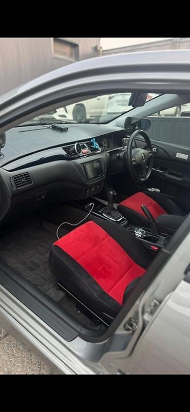 мицу биси: Mitsubishi Lancer Evolution: 2003 г., 2 л, Автомат, Бензин, Седан — 9