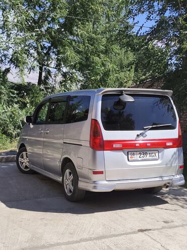 обмен с моей доплатой: Серебристый минивэн Nissan Serena с тонированными стеклами, багажным