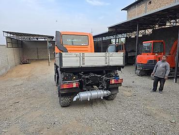 Другой строительный транспорт: Mercedes-Benz Unimog U400 (оранжевый) - Полный привод 4x4, высокие — 6