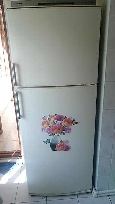 Soyuducular: İşlənmiş soyuducu alıram Xüsusiyyətlər: - Üst kamera dondurucu, alt — 7