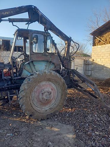 Ekskavatorlar: Ekskavator-yükleyici (traktor bazalı) – ön bıçaq və arxa ekskavator — 2