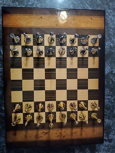 ♟️ Metal fiqurlu lüks şahmat dəsti – 45×32 sm Satılır yüksək