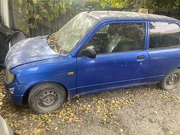 машина берем: Daihatsu Cuore: 2002 г., 1 л, Механика, Бензин, Хэтчбэк — 1