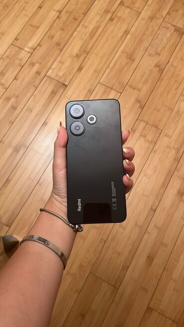 Qaşıqlar: Redmi 13 smartfon – qara rəng 256gb. İdeal vəziyyətdədir. Heç bir