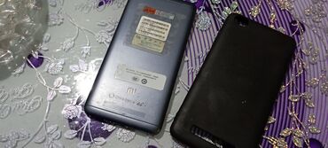rəsmi not9: Xiaomi Redmi 4A, 2 GB, rəng - Boz, 
 Sensor, İki sim kartlı