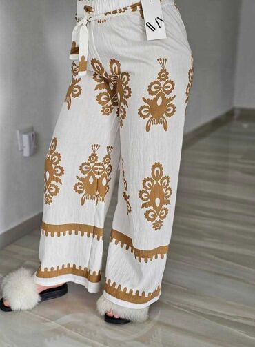 Pantalone: 06. Pantalone 
M/L i Xl/2xl — 20