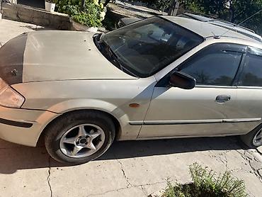 мотор нексия 1: Mazda 323: 1999 г., Седан — 2