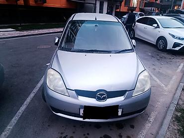 света музука: Mazda Demio: 2006 г., 1.3 л, Автомат, Бензин, Хэтчбэк — 2