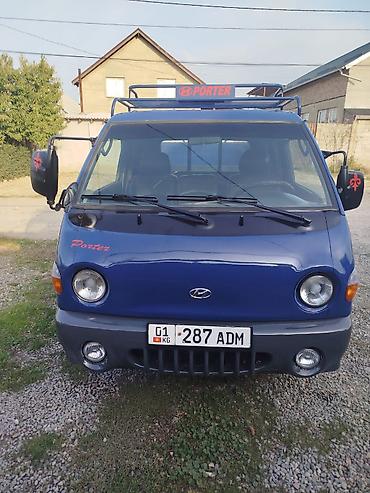 smart open: Hyundai Porter — компактный бортовой грузовик синего цвета. Основные — 9