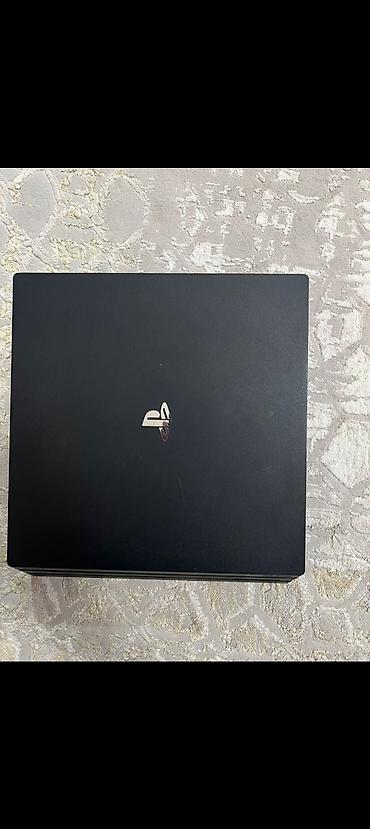PS4 (Sony Playstation 4): Sony PlayStation 4 Pro oyun konsolu - Rəng: Qara, üçqat korpus — 1