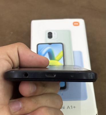 m50 qara: Redmi A1+ – smartfon - Ekran: 6.52" HD+ böyük displey, damcı tipli — 5
