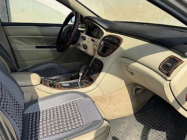 discovery sport: Peugeot — интерьер седана бизнес‑класса с бежевым салоном и — 2
