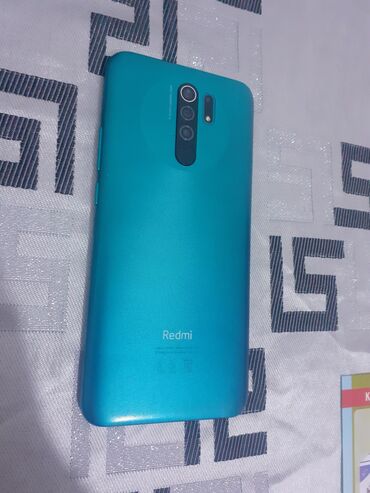 3 sim kartlı telefonlar: Xiaomi Redmi 9, 32 GB, rəng - Yaşıl, 
 Barmaq izi, İki sim kartlı