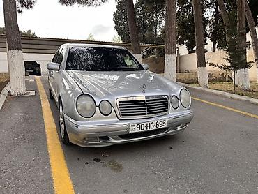 kuzu: Mercedes-Benz E-Class (W210) sedan, gümüşü rəng. - Kuzov: 4 qapılı — 1