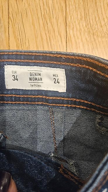 velicina farmerki 28: Farmerice u veličini 34 pine elastina. Imaju visoki struk i 7/8 široke — 1