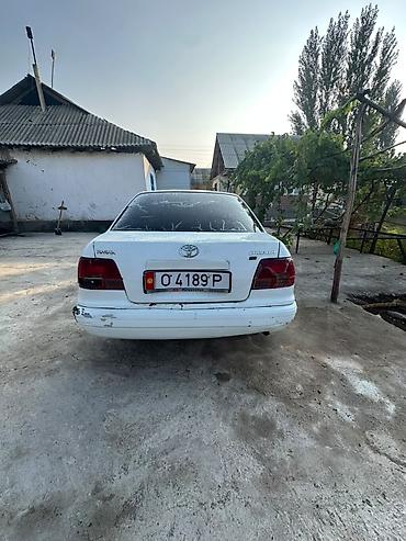 проверка номера авто: Toyota Corolla: 1996 г., Бензин, Седан — 4