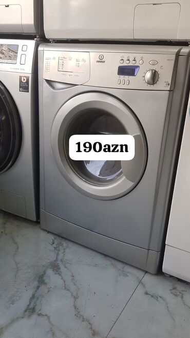 Paltaryuyan maşınlar: Indesit önyükləməli paltaryuyan maşın - Rəng: gümüş - Ön paneldə