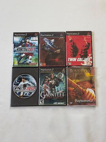 playstation 2 oyunlar: PlayStation 2 oyun konsolu dəsti. Dəstə şəkildə görünən əsas — 3