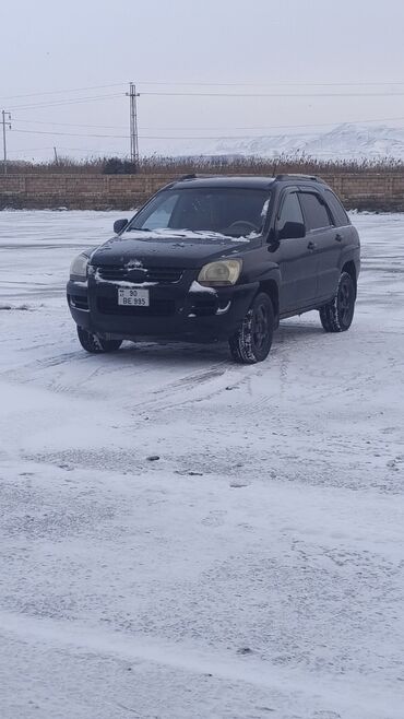 Kia Sportage: 2 l | 2007 il Ofrouder/SUV