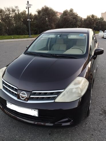 Nissan: Nissan Tiida: 1.6 l | 2011 il Hetçbek