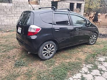 салон на фит: Honda Fit/Jazz — компактный хэтчбек, салон. - Руль с эмблемой Honda — 2