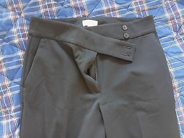 Pantalone: H&M Crne elegantne ženske pantalone sa širokom nogavicom. Model — 9