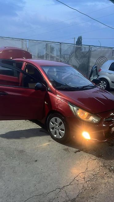 infinity fx35: Hyundai Solaris: 2014 г., Механика, Бензин — 1
