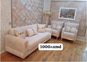 - 3 hissəli dəst: 1 iri divan + 2 kreslo - Rəng: krem/bej tonları -