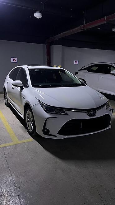 mcv 21: Toyota Corolla: 2020 г., Гибрид, Седан — 2