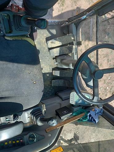 Экскаваторы: Экскаватор, 2006 г., Колесный — 6