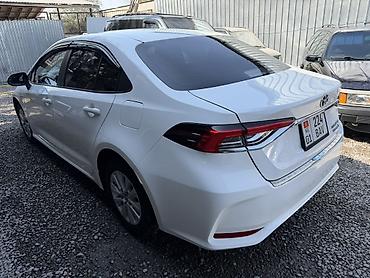 byd 06 ev: Toyota Corolla: 2021 г., 1.8 л, Автомат, Гибрид, Седан — 4