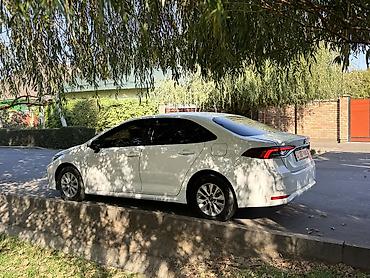 corolla 2016: Toyota Corolla: 2021 г., 1.8 л, Вариатор, Гибрид, Седан — 4