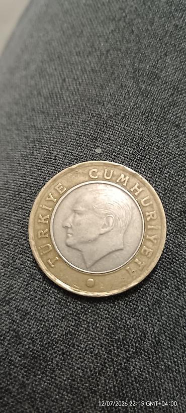 lira: Məhsul: Türkiyə 1 Türk Lirəsi sikkəsi - İl: 2009 - Nominal: 1 TL - — 2