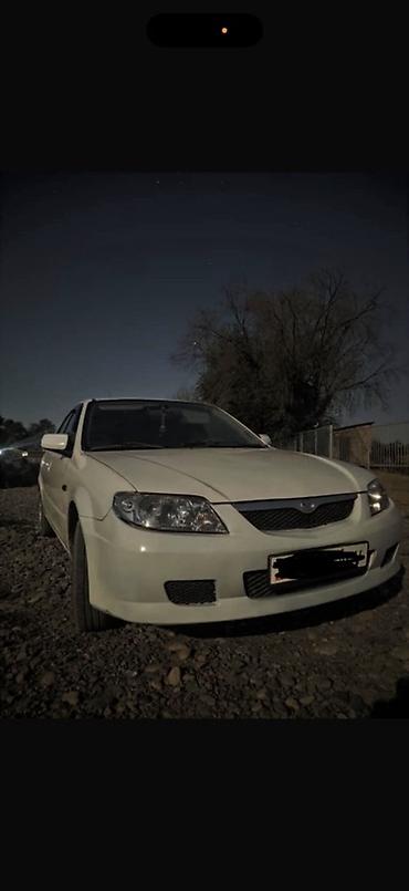 универса: Mazda Familia: 1999 г., 1.6 л, Механика, Бензин, Универсал — 1