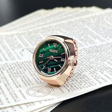 Üzüklər: ✨ Saat formalı üzük vintage – həm fərqli, həm zərif! 💍 Polad