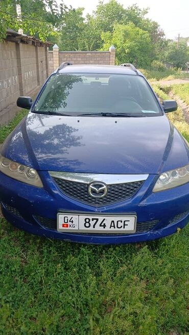 кио к5: Mazda 7: 2000 г., 2 л, Автомат, Бензин, Универсал