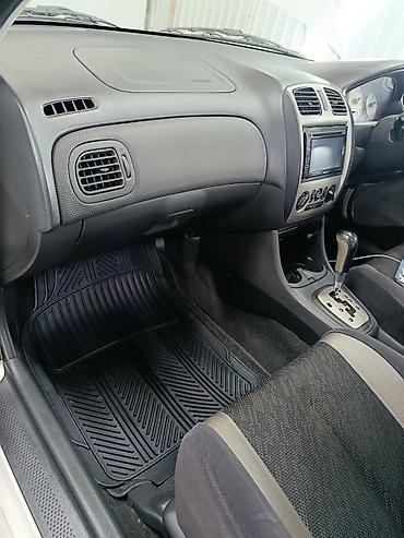 Mazda: Mazda Familia: 2001 г., 2 л, Автомат, Бензин, Универсал — 11