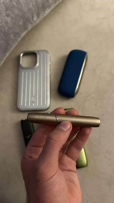 iqos case: 4 dene IQOS cihazları və aksesuarlar dəsti Tərkib: - IQOS stick-lər — 6