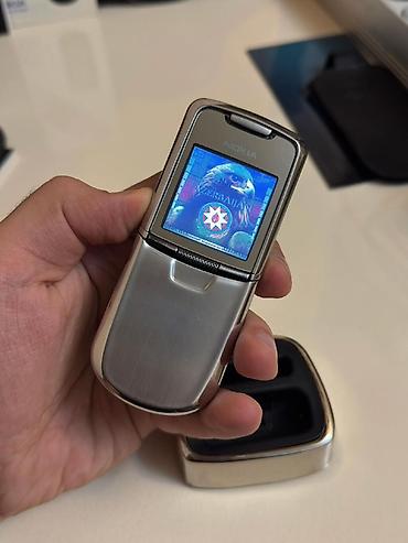 телефон fly nimbus 1: Nokia 8 Sirocco, цвет - Серебристый, Кнопочный — 1