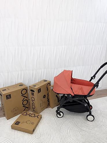 коралловые: Эта коляска — Stokke YOYO (в комплектации с люлькой для новорожденных) — 1