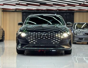 хундай алантра: Черный седан Hyundai с современным дизайном кузова и выразительной