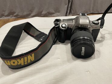 профессиональный фотоаппарат никон: Пленочный фотоаппарат Nikon N65 С объективом 28-80 встроенная