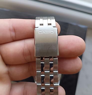 5 15: Casio kişi qol saatı - Model: MTP seriyası (arxa qapaqda MTP-1383 — 2