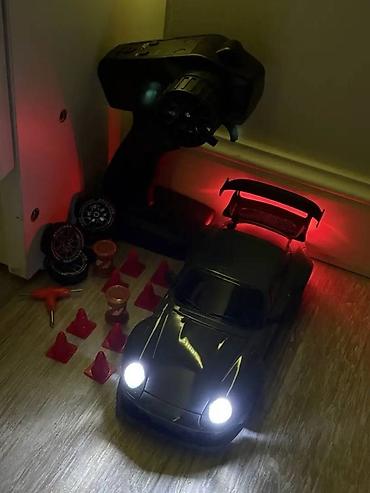oyuncaklar: Pultlu maşın "Porsche 911 Drift Car" Pultla və batareya ilə idarə — 9