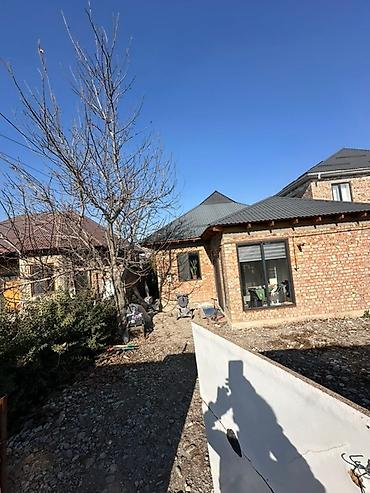 Продажа коттеджей и домов: Просторная кухня‑гостиная и комната с современным ремонтом. Кухня: - — 16